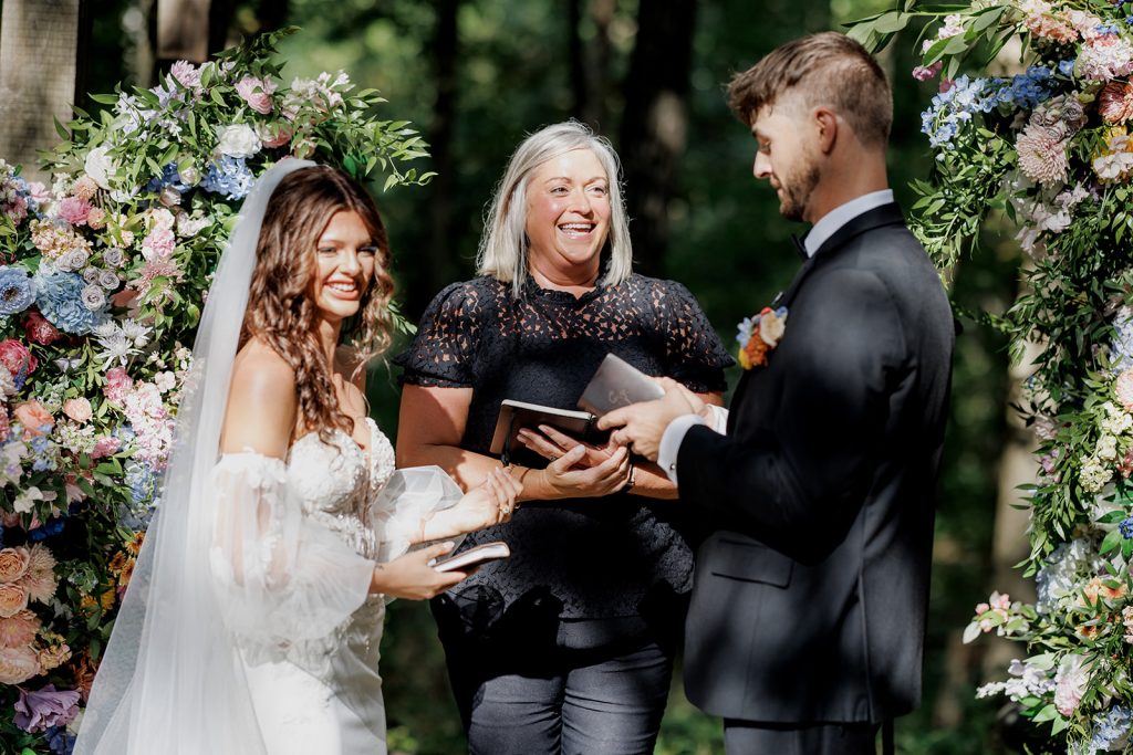 Colorful floral wedding ceremony setup in Rock Hill, SC, designed by Crafted Charm Wedding Planning, featuring vibrant blooms and elegant decor