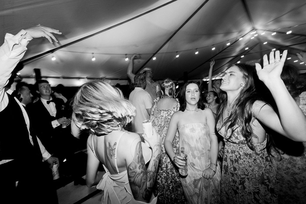 Exciting wedding reception in Charlotte, NC with FMG Event Co DJ, beautifully coordinated by Crafted Charm Wedding Planning, offering stunning design, planning, and florals