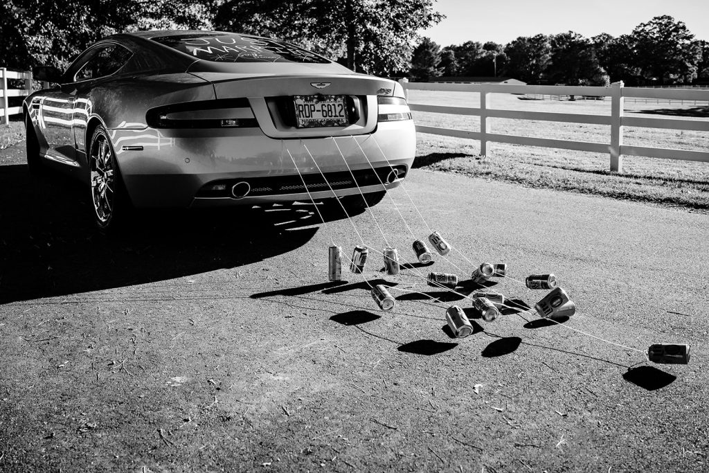 Getaway Newlywed Car with cans and string at Pleasant Grove Farm