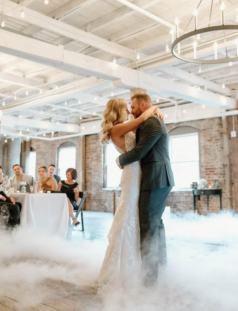 dancing on clouds bride and groom the downtown warehouse wedding- concord, nc