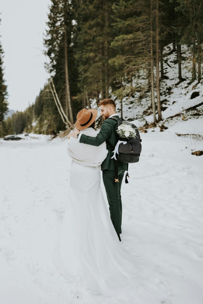 winter weather wedding plan- bride and groom portrait