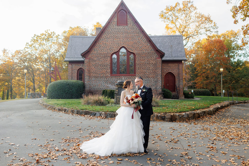 Bride and Groom at Wedding at The Rafters at Historic St. Mark’s- Huntersville, NC wedding- fall theme wedding