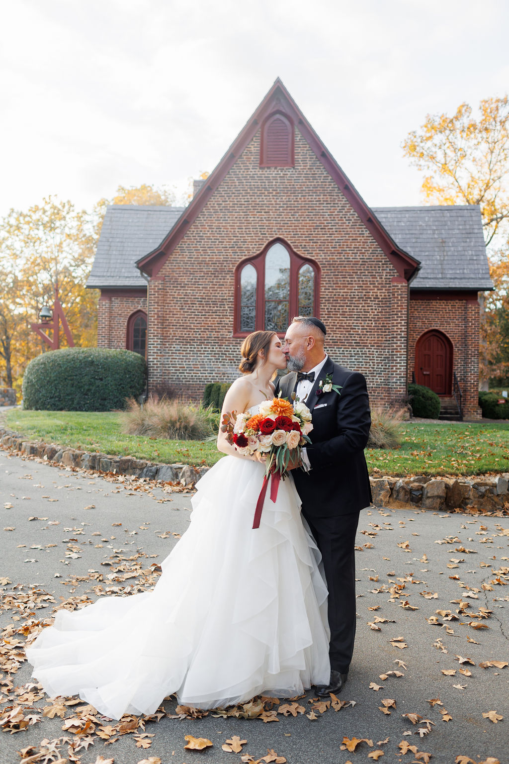 Bride and Groom at Wedding at The Rafters at Historic St. Mark’s- Huntersville, NC wedding- fall theme wedding