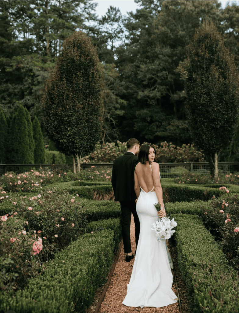 The-Andrews-Farm_Samantha-Grig_ Bride and Groom English Gardens outside