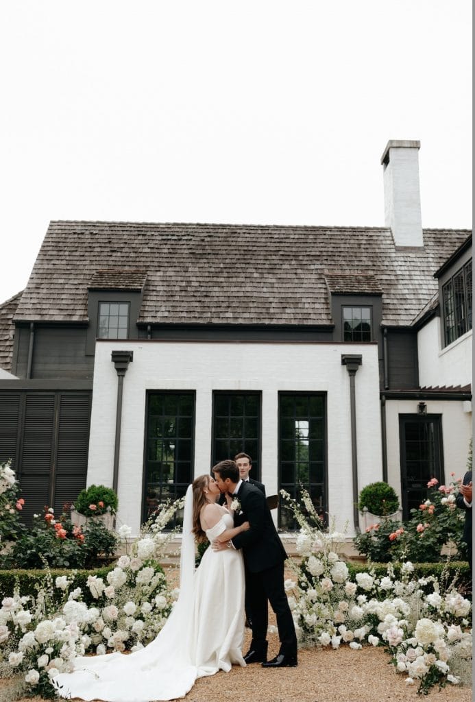 The-Andrews-Farm_Samantha-Grig_ Bride and Groom Kiss Portrait at Ceremony outside