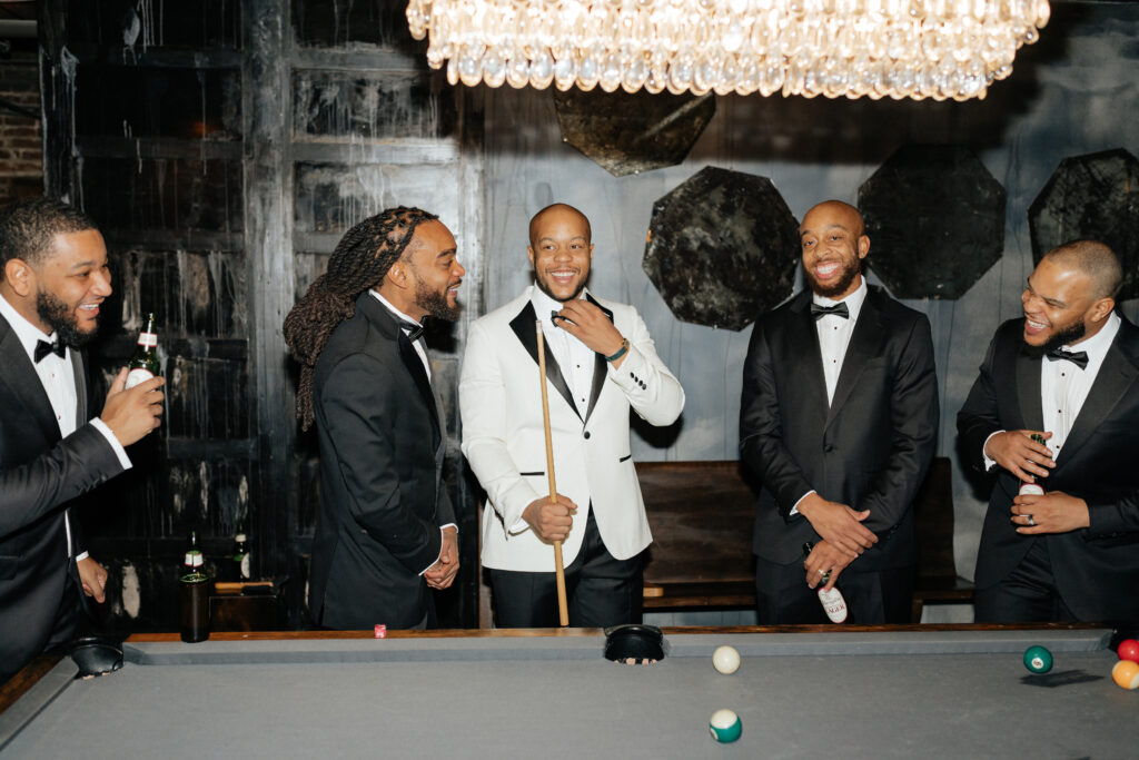 Winter Moody Wedding- Uptown Indigo- Shelby, NC Wedding- Groom playing pool with groomsmen