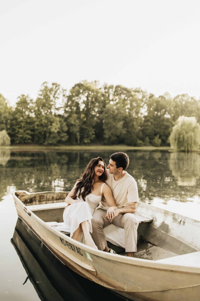 Sophie-Morris-Photography_-Splendor-Pond_Couple in Boat on Pond at Mooresville Wedding Venue
