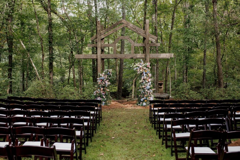 Colorful floral wedding ceremony setup in Rock Hill, SC, designed by Crafted Charm Wedding Planning, featuring vibrant blooms and elegant decor