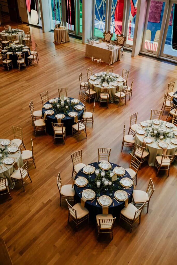 wedding with navy, sage and blush in uptown Charlotte, nc at the mint museum uptown with an art deco wedding style