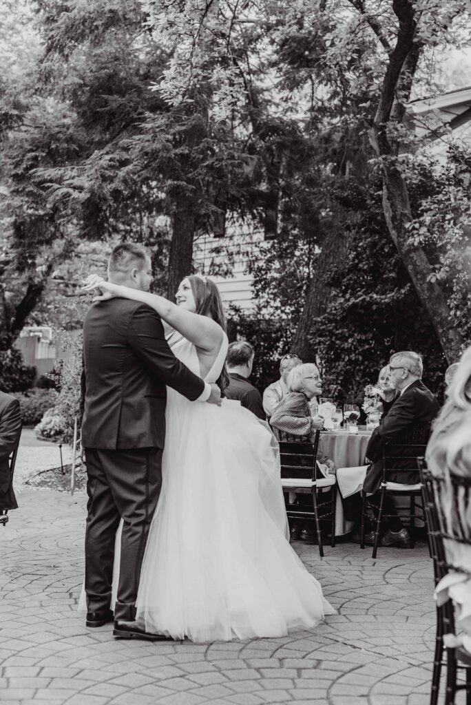 bride and groom dancing first dance at the Morehead inn in Charlotte nc at a luxury estate wedding