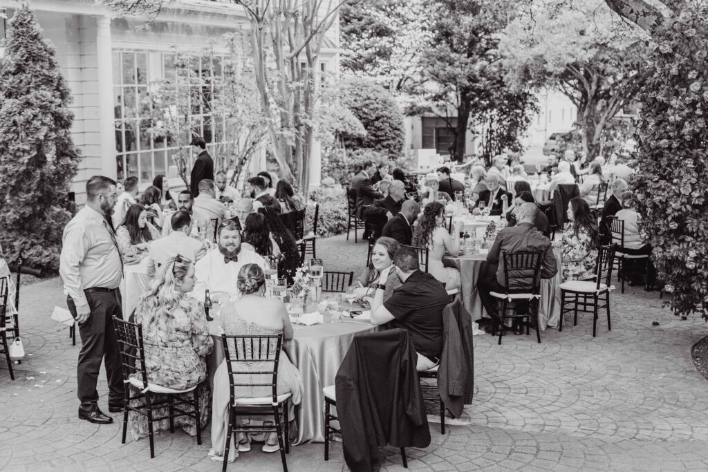 guests seated at the Morehead inn in Charlotte nc at a luxury estate wedding