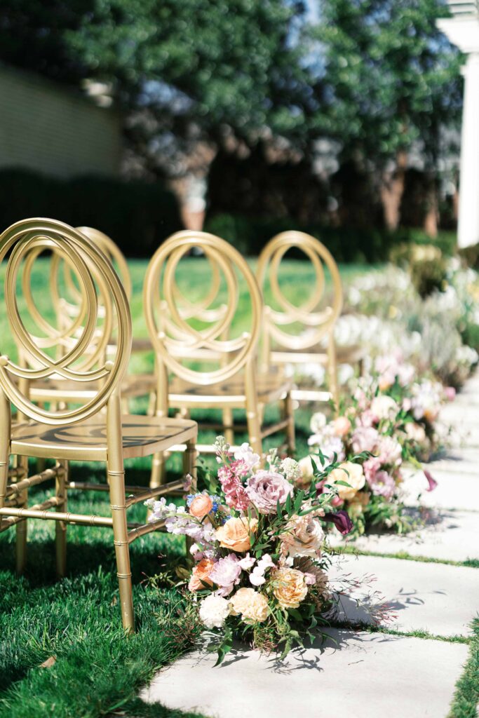 Luxury Spring Color Southern Wedding at Separk Mansion in Gastonia NC by Crafted Charm- outdoor ceremony with aisle floral meadow