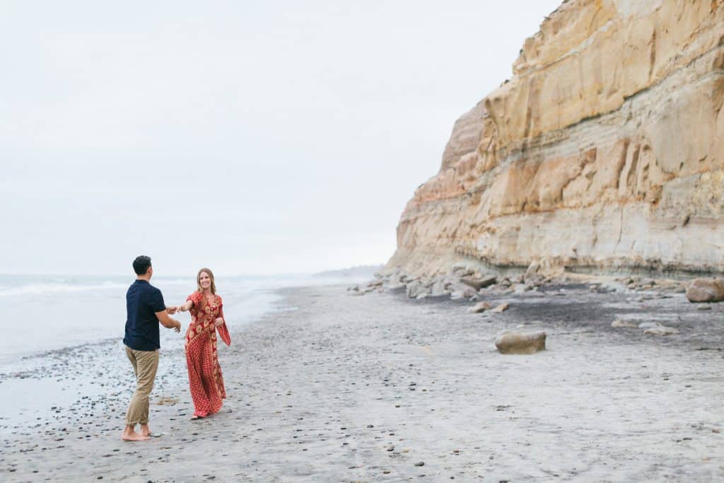 engagement photo session of couple portraits- waterfront beach