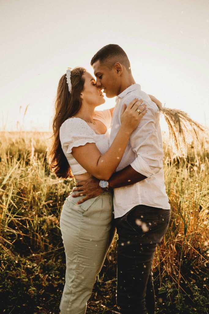 engagement photo session of couple portraits- in a field