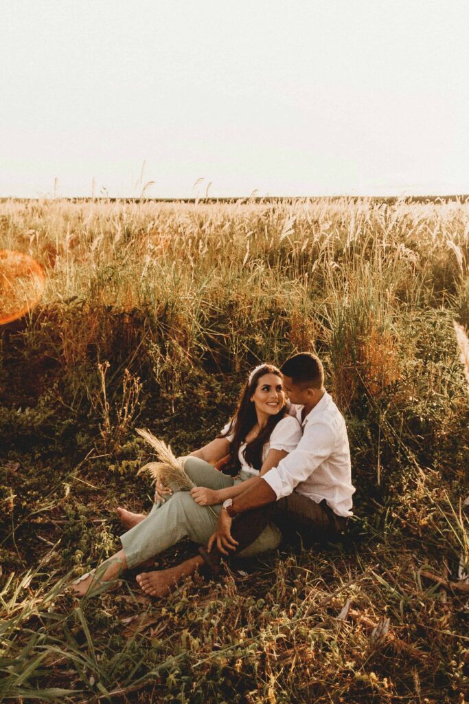 engagement photo session of couple portraits- in a field
