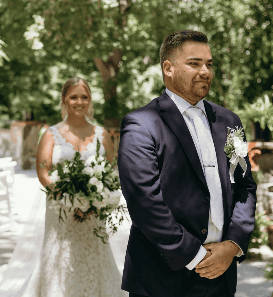 bride and groom portraits at historic Robertson homestead in rock hill SC at a classic white and green styled wedding in a natural setting and historic estate