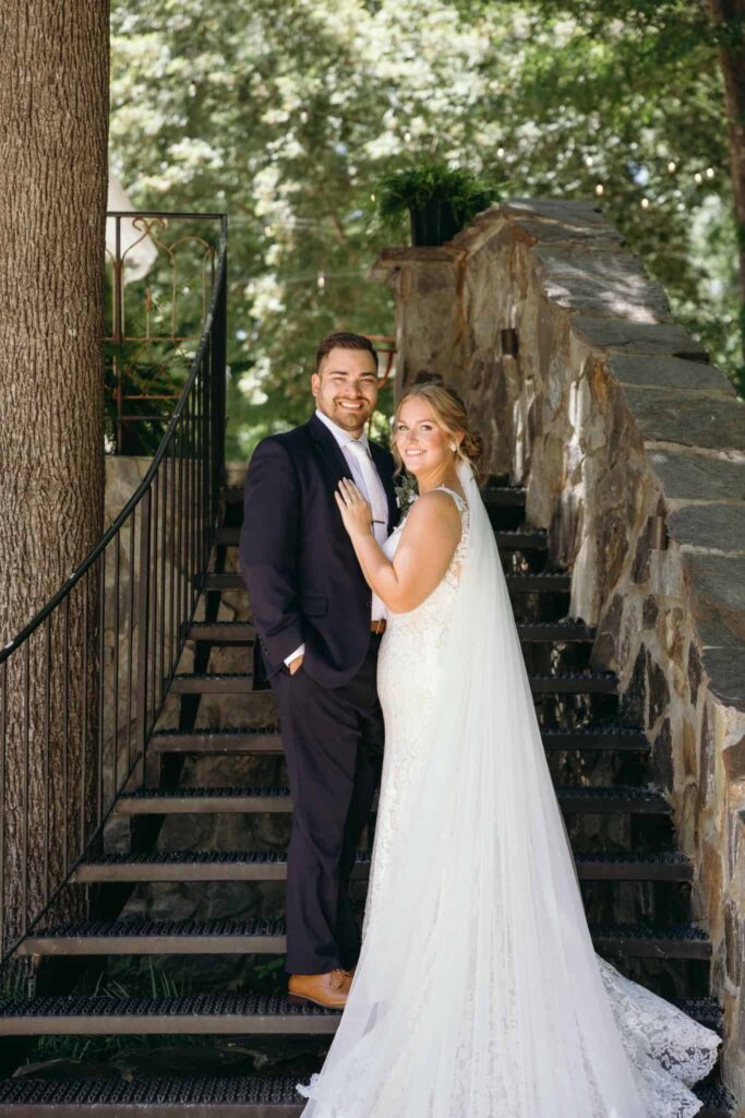 bride and groom portraits at historic Robertson homestead in rock hill SC at a classic white and green styled wedding in a natural setting and historic estate