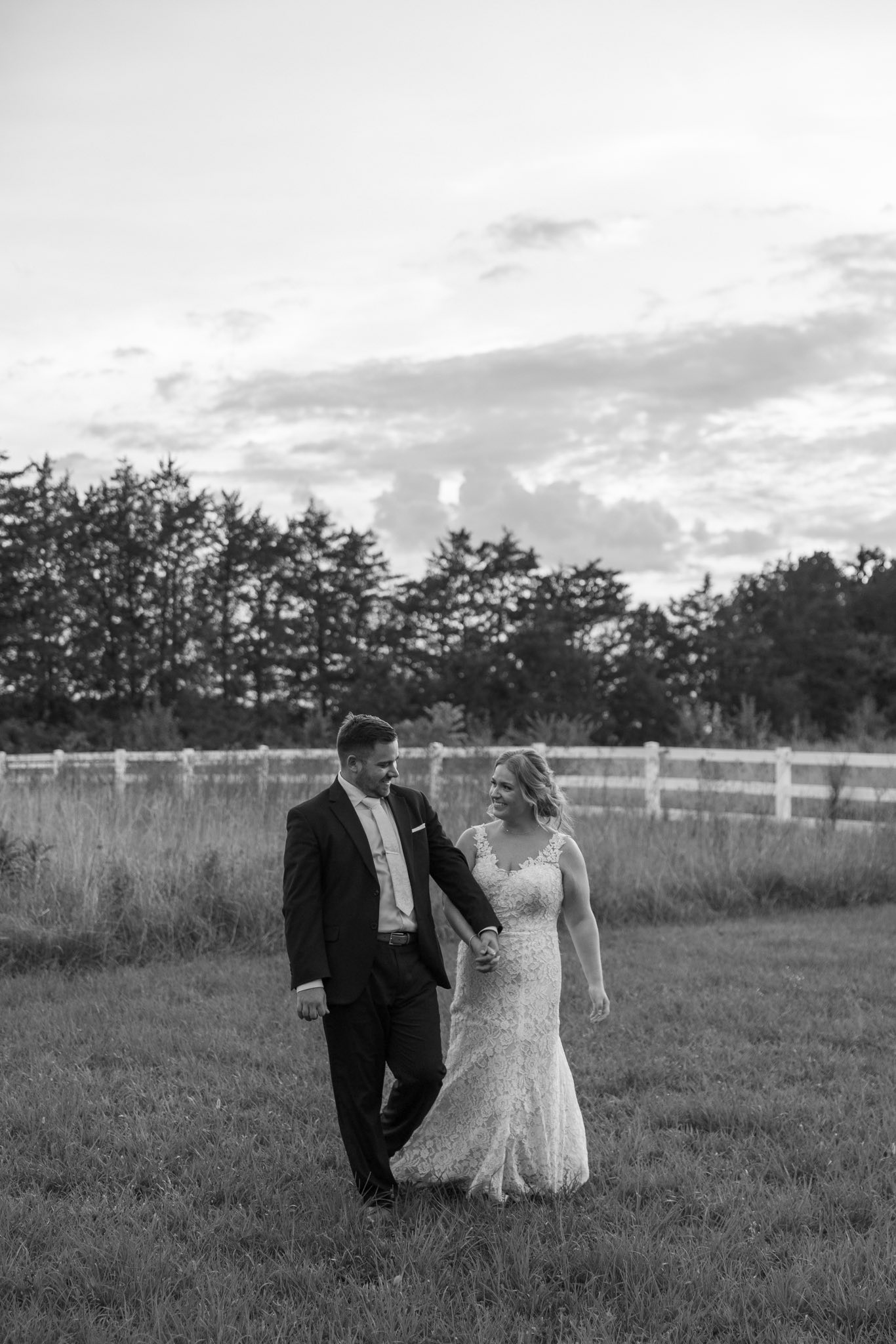bride and groom portraits at historic Robertson homestead in rock hill SC at a classic white and green styled wedding in a natural setting and historic estate