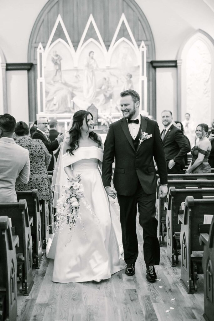 bride and groom, in St. Peters Catholic Church in Charlotte NC at ceremony