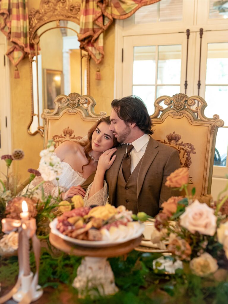 Le Chateau Du Coeur Wedding- bride and groom in parlor