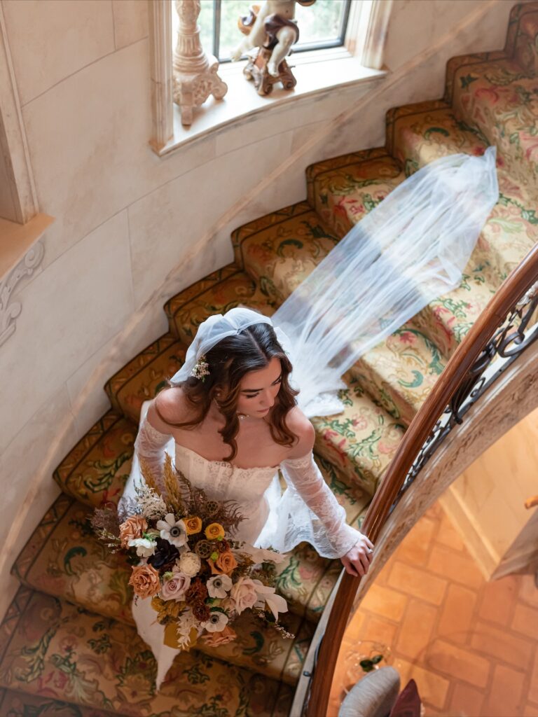 Le Chateau Du Coeur Wedding- bride portrait on stairway