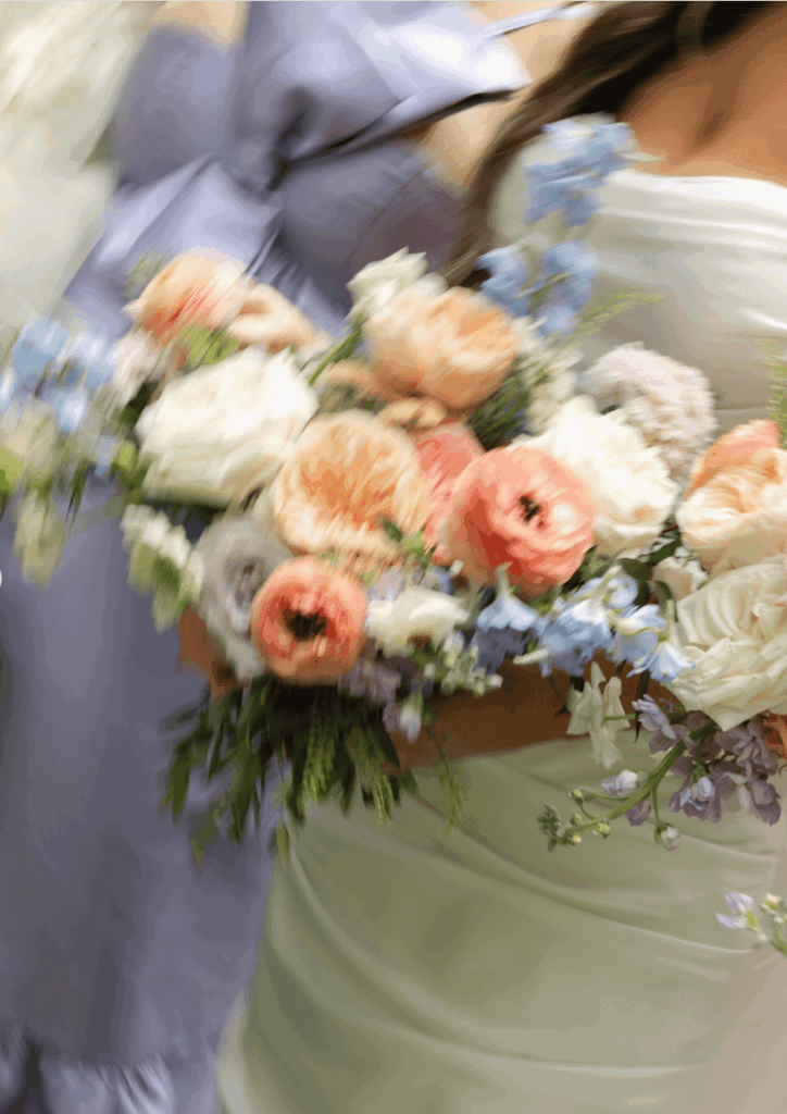 Bride holding florals, spring wedding in Charlotte NC at VanLandingham Estate