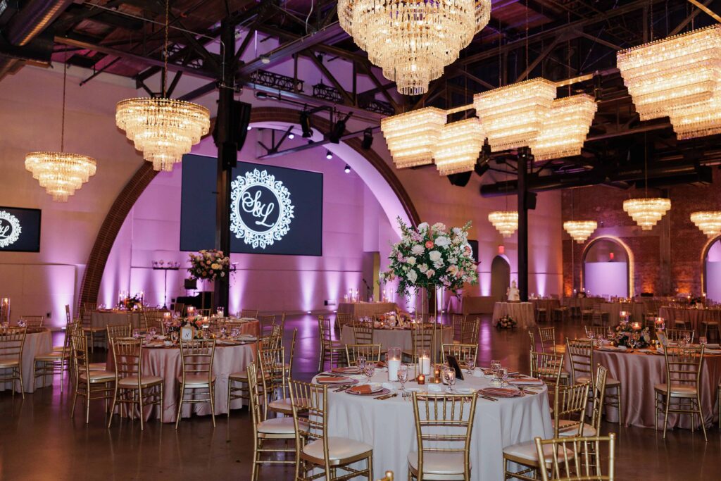 The Revelry Charlotte NC wedding venue decorated in luxury florals with gold and soft pink accents by Crafted Charm Florals